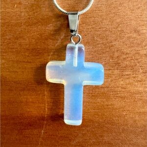 Moonstone Cross on sterling silver plated chain.